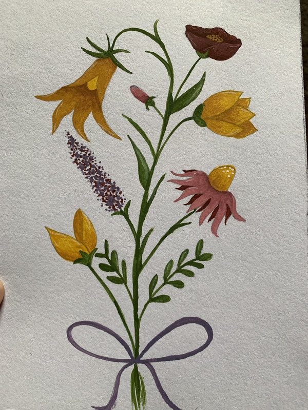 A photograph of a watercolor painting of flowers on a white background. Several different flowers and leaves appear to grow out from the same stem. At the top is a dark red flower. Below it on both sides are two yellow flowers and a pink bud. There is a purple flower on the left in the middle and a pink flower with a yellow center on the right. On the bottom is a yellow flower on the left and oval-shaped green leaves on the right. The stems are tied together with a purple ribbon.